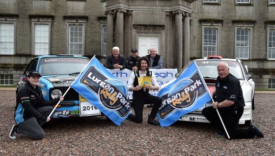 Mayor of Armagh City, Banbridge and Craigavon Borough Council, Councillor Garath Keating, front centre, pictured at the launch of the Lurgan Park Rally with back row from left, Brian Stinson, Orchard Motorsport, sponsor; Frank Kelly, Driver,and Willaim Fullerton, rally director. Front from left, Lauren Kelly and Kenny McKinstry, driver.