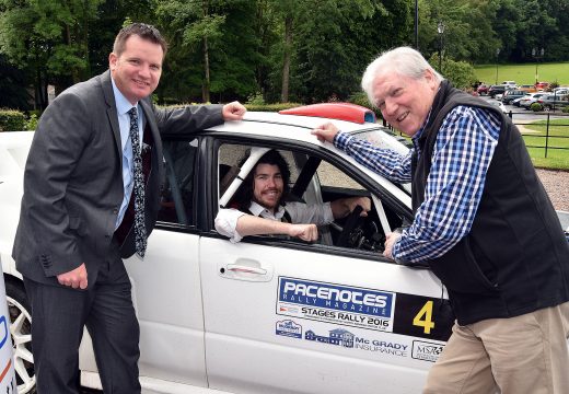 Mayor of Armagh City, Banbridge and Craigavon Borough Council, Councillor Garath Keating tries out one of the rally cars at the launch of the Lurgan Park Rally with Councillor Glenn Barr, left, chairman of the Leisure Services Committee, and William Fullerton, rally director.